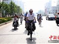 向往拉萨 六旬聋哑人骑车千里赴西藏（图）